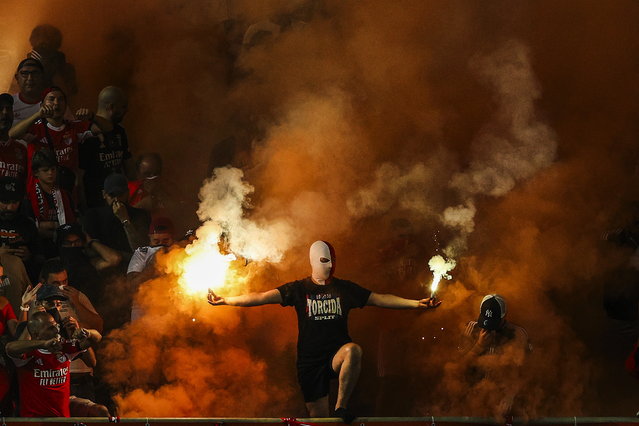 Benfica supporters cheer during the Portuguese Supercup soccer match between Sporting CP and SL Benfica at Algarve Stadium, in Faro, Portugal, 31 July 2025. (Photo by Miguel A. Lopes/EPA)