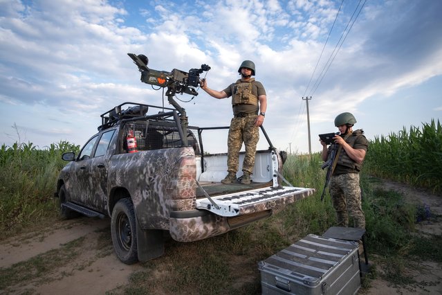 A mobile position of the Kyiv Territorial Anti-Aircraft Defence during guard duty in the east of the region in Kyiv, Ukraine, 14 July 2025. The Kyiv Territorial Anti-Aircraft Defence team works from mobile positions where they operate a Browning M2 12.7 calibre heavy machine gun which they mainly use to shoot down Shahed drones during Russian air strikes. (Photo by Maria Senovilla/EPA)