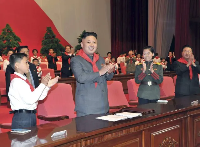 North Korean leader Kim Jong-Un applauds during the 7th Congress of the Korean Children's Union (KCU) at the April 25 House of Culture in Pyongyang June 6, 2013 in this photo released by North Korea's Korean Central News Agency (KCNA) June 7, 2013. (Photo by Reuters/KCNA)