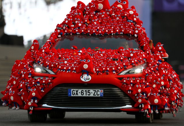 The Phryge car appears at the Place de la Concorde during the Paris 2024 Paralympic Games Opening Ceremony in Paris on August 28, 2024. (Photo by Franck Fife/AFP Photo)