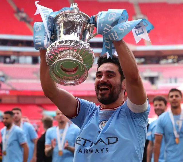 Ilkay Gundogan of Manchester City celebrates with the trophy after the FA Cup final match between Manchester City and Manchester United at Wembley Stadium on June 03, 2023 in London, England. (Photo by Shaun Brooks/Action Plus/Rex Features/Shutterstock)