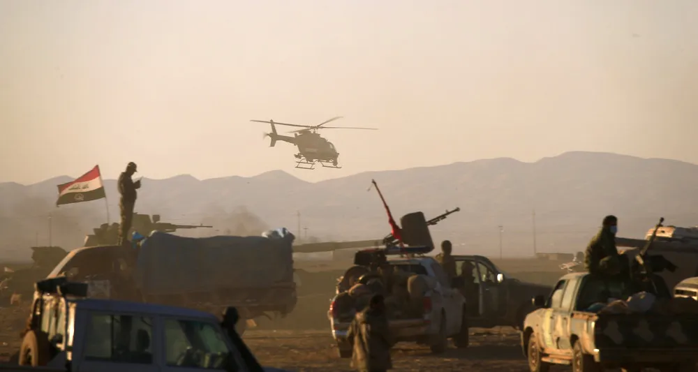 Iraqis Flee Mosul Fighting