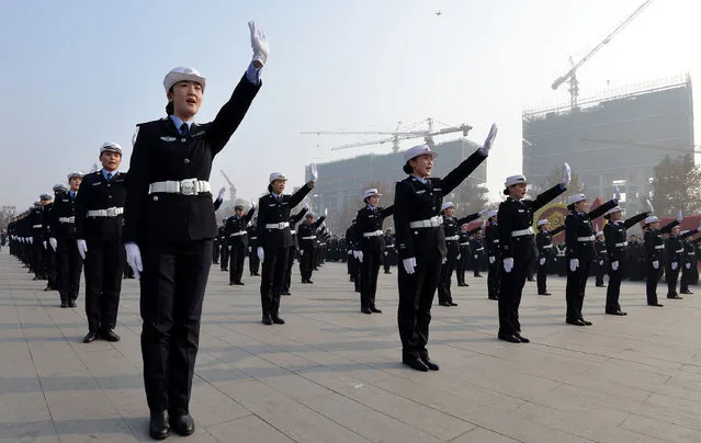 Police perform during an event to mark the National Safe Traffic Day, in Handan, Hebei province, China, December 2, 2016. (Photo by Reuters/Stringer)