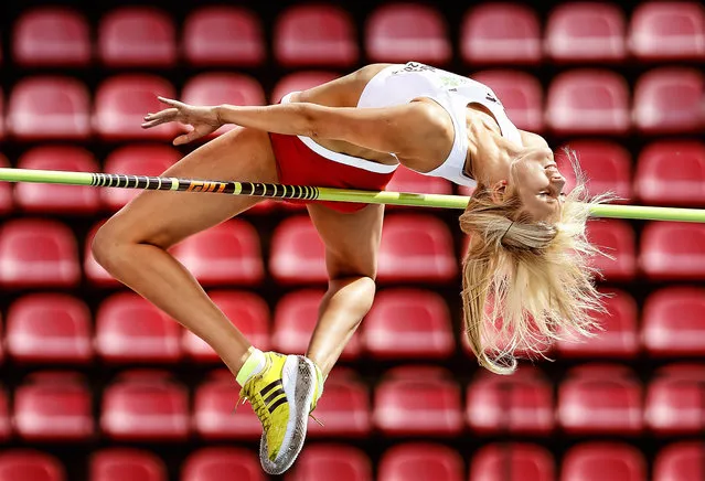 Sports Finalist – Ian MacNicol. Michalina Kwasniewska of Poland competes in the Women's high jump during day one of The European Athletics U23 Championships 2013  on July 11, 2013 in Tampere, Finland. (Photo by Ian MacNicol/Agence France-Presse)