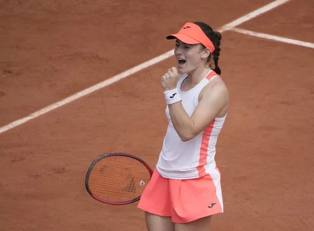 Slovenia's Tamara Zidansek celebrates after winning a point against Romania's Sorana Cirstea during their fourth round match on day 8, of the French Open tennis tournament at Roland Garros in Paris, France, Sunday, June 6, 2021. (Photo by Christophe Ena/AP Photo)