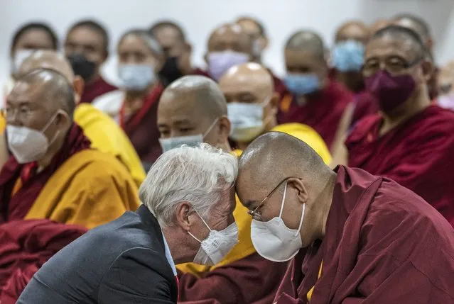 Hollywood actor Richard Gere, left, greets Ling Rinpoche, a prominent Tibetan Buddhist leader, during the inauguration of a museum by the Dalai Lama in Dharmsala, India, Wednesday, July 6, 2022. Exile Tibetans also celebrated Dalai Lama's 87th birthday today. (Photo by Ashwini Bhatia/AP Photo)