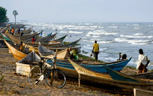 A file picture dated 22 February 2011 shows fishing boats on the shore of Lake Albert in Butiaba, some 250km northwest of the capital Kampala, Uganda. At least 9 people died when a boat carrying a football team and their fans capsized on Lake Albert, Ugandan police said on 26 December 2016. (Photo by Dai Kurokawa/EPA)