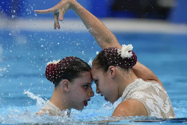 Alisa Ozhogina Ozhogin and Iris Tio Casas of Spain compete in the duet free routine final at the the 2020 Summer Olympics, Wednesday, August 4, 2021, in Tokyo, Japan. (Photo by Alessandra Tarantino/AP Photo)