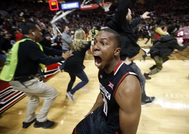 Texas Tech's Toddrick Gotcher runs toward fans to celebrate after an NCAA college basketball game against Oklahoma on Wednesday, February 17, 2016, in Lubbock, Texas. Texas Tech won 65-63. (Photo by Brad Tollefson/AP Photo)