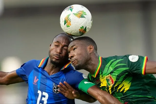 Namibia's Peter Shalulile, left, goes for the header with Mali's Moussa Diarra, during the African Cup of Nations Group E soccer match between Namibia and Mali, at the Laurent Pokou Stadium in San Pedro, Ivory Coast, Wednesday, January 24, 2024. (Photo by Sunday Alamba/AP Photo)