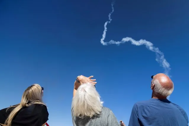 A rocket launches during Rocstock, at Lucerne Dry Lake, California, U.S., November 14, 2021. (Photo by Aude Guerrucci/Reuters)