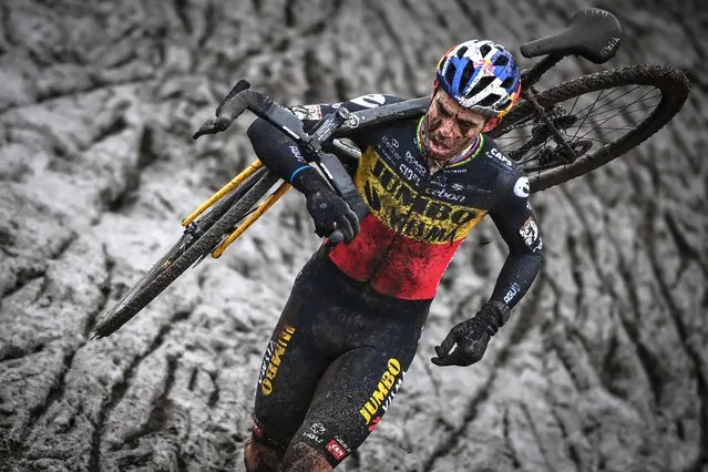 Belgian Wout Van Aert pictured in action during the men's elite race at the Cyclocross World Cup cyclocross event in Dendermonde, Belgium, Sunday 26 December 2021, the eleventh stage (out of 16) in the World Cup of the 2021-2022 season. (Photo by Rex Features/Shutterstock)
