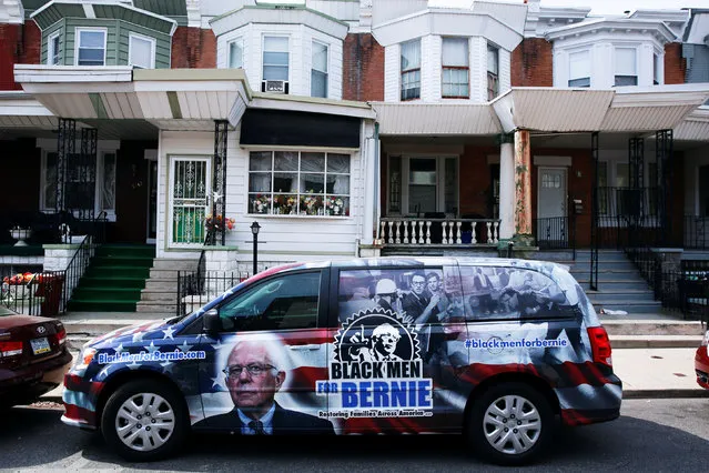 A van emblazoned with decals supporting Democratic U.S. presidential candidate Bernie Sanders stands on a street outside a location where he addressed supporters in West Philadelphia, Pennsylvania, U.S., April 22, 2016. (Photo by Lucas Jackson/Reuters)