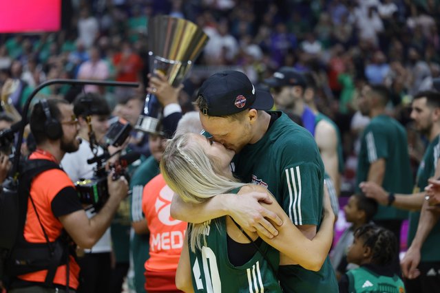 Panathinaikos' Marius Grigonis (R) celebrates with wife Salomeja Karvelyte (L) after winning the Euroleague Basketball final match between Real Madrid and Panathinaikos Athens in Berlin, Germany, 26 May 2024. (Photo by Ronald Wittek/EPA/EFE)