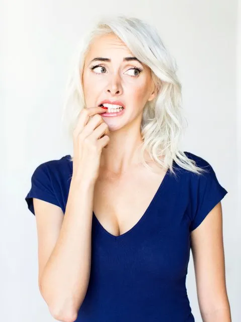 Studio shot of woman biting nails. (Photo by Jessica Peterson/Getty Images)