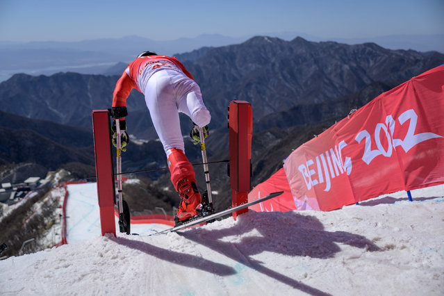 Gong Yan of Team China flies out of the gate at the Para Alpine Skiing Men's Super Combined Super-G Standing at Yanqing National Alpine Skiing Centre during day three of the Beijing 2022 Winter Paralympics on March 07, 2022 in Yanqing, China. (Photo by Joel Marklund for OIS/PA Wire)