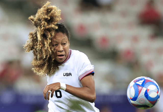 US' defender #06 Casey Krueger looks at the ball in the women's group A football match between the USA and Zambia during the Paris 2024 Olympic Games at the Nice Stadium in Nice, on July 25, 2024. (Photo by Valery Hache/AFP Photo)