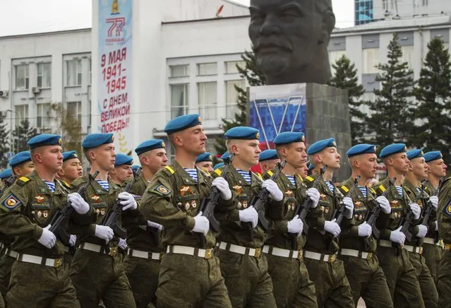 Russian servicemen march during the Victory Day military parade in Ulan-Ude, the regional capital of Buryatia, a region near the Russia-Mongolia border, Russia, Monday, May 9, 2022, marking the 77th anniversary of the end of World War II. (Photo by AP Photo/Stringer)