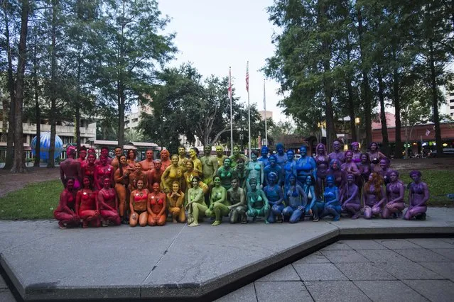 A human rainbow is created at a BASEOrlando coordinated event, “Orlando Strong Body Paint”, on Friday, June 17, 2016 in Orlando, Fl. (Photos by Amanda Voisard/The Washington Post)
