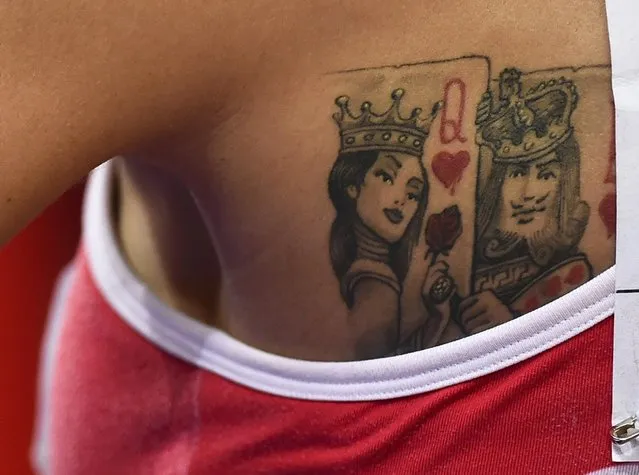 A tattoo is seen on the back of Ivana Spanovic of Serbia as she competes in the women's long jump final during the 15th IAAF World Championships at the National Stadium in Beijing, China, August 28, 2015. (Photo by Dylan Martinez/Reuters)
