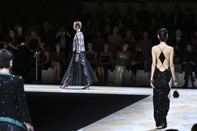 A model for Armani presents a creation during the “One Night Only Venice” fashion show coinciding with the 80th edition of the International Film Festival at the Venice Lido, Saturday, September 2, 2023. The One Night Only series has so far hit London in 2006; Tokyo in 2007; Beijing in 2012; Rome and New York in 2013; Paris in 2014, and Dubai in 2021. (Photo by Gian Mattia D'Alberto/LaPresse via AP Photo)