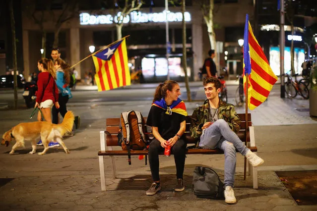 Protesters gather in the city centre to demonstrate against the Spanish federal government's move to suspend Catalonian autonomy on October 21, 2017 in Barcelona, Spain. The Spanish government announced measures today it will implement in triggering Article 155, which would lead to the imposition of direct rule by Spanish authorities in Catalonia and at least temporarily suspend the region's autonomy. The government also plans to hold Catalan regional elections in January. The moves come after Catalan regional President Carles Puigdemont let a Thursday deadline pass and threatened to go forward with Catalan independence. (Photo by Jack Taylor/Getty Images)