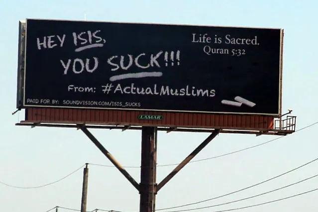 Muslims have paid for this billboard in Chicago, Illinois which reads: “Hey Isis, you suck! From #RealMuslims” Plus the Quran quote: “Life is sacred”. The advertisement was designed to promote understanding between Muslims and non Muslims in the USA, fight extremism and radicalisation among Muslim youth and combat islamophobia. It was funded by professional Americans who follow the Islamic religion, via the non-profit action group Sound Vision. “Sound Vision specialises in building bridges of understanding through public relations and media”, said the executive director of the charity Mohammad Siddiqi. (Photo by Sound Vision/Splash News)