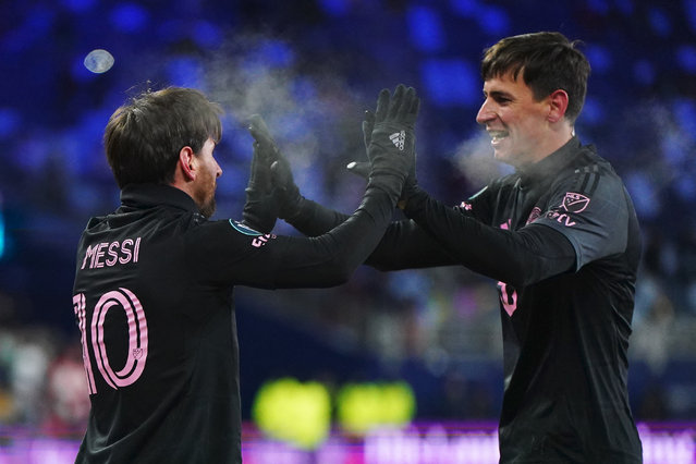 Lionel Messi of Inter Miami celebrates with teammate Tadeo Allende after scoring the team's first goal during a 2025 Concacaf Champions Cup first leg match between Sporting Kansas City and Inter Miami at Sporting Park on February 19, 2025 in Kansas City, Kansas. (Photo by Kyle Rivas/Getty Images/AFP Photo)