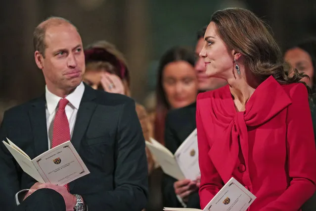 Britain's Prince William, left and Kate, the Duchess of Cambridge attend the “Royal Carols – Together At Christmas”, a Christmas carol concert hosted by the duchess at Westminster Abbey in London,  Wednesday December 8, 2021. The service will be broadcast on Christmas Eve in England. (Photo by Yui Mok/Pool via AP Photo)