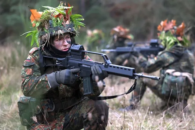 New army (Heer) recruits of the Bundeswehr, Germany's armed forces, drill a tactical manoeuvre called a Schützenrudel during basic training on November 29, 2022 near Prenzlau, Germany. German Chancellor Olaf Scholz, following Russia's invasion of Ukraine, pledged to create a special fund of EUR 100 billion to invest in Germany's armed forces, which will go to both high tickets investments like modern attack aircraft and transport helicopters but also into improved preparedness of existing equipment. (Photo by Sean Gallup/Getty Images)