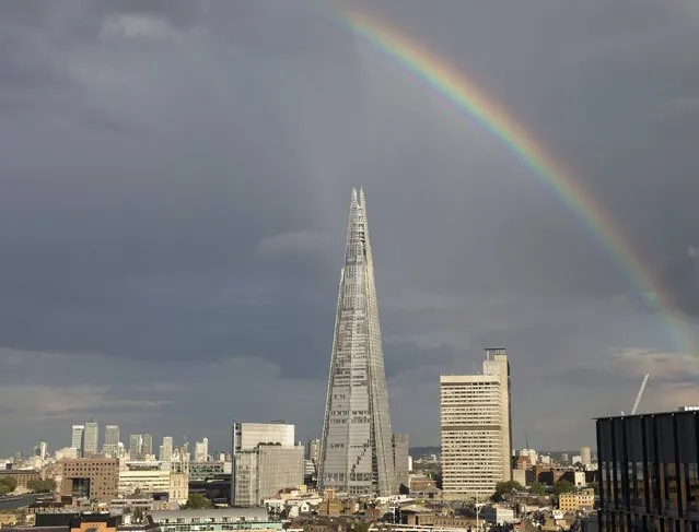 A rainbow is seen over the Shard building in central London, Britain September 2, 2015. Photograph taken September 2, 2015. (Photo by Eddie Keogh/Reuters)