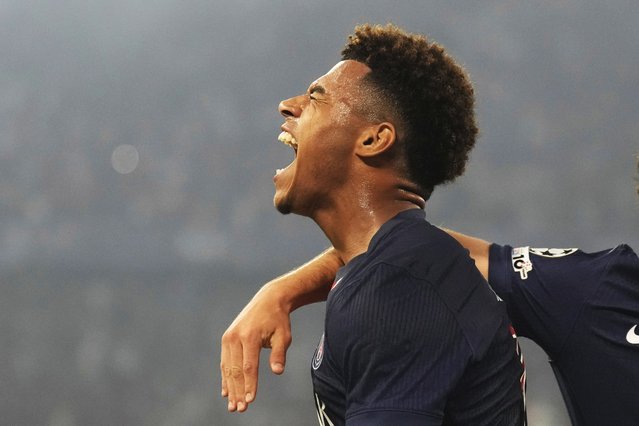 PSG's Desire Doue celebrates after scoring his side's second goal during the Champions League final soccer match between Paris Saint-Germain and Inter Milan at the Allianz Arena in Munich, Germany, Saturday, May 31, 2025. (Photo by Matthias Schrader/AP Photo)