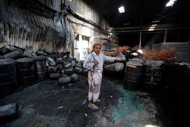A guard shows damage at the Alsonidar Group's water pumps and pipes factory days after it was hit by Saudi-led air strikes in Sanaa, Yemen September 15, 2016. (Photo by Khaled Abdullah/Reuters)