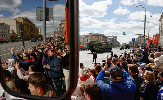 Spectators watch Russian Yars intercontinental ballistic missile systems move after a military parade on Victory Day on May 9, 2025. (Photo by Yulia Morozova/Reuters)