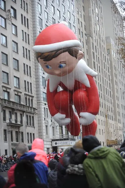 The Elf on the Shelf Balloon floats at the  88th Annual Macy's Thanksgiving Day on November 27, 2014 in New York City. (Photo by Brad Barket/Getty Images)
