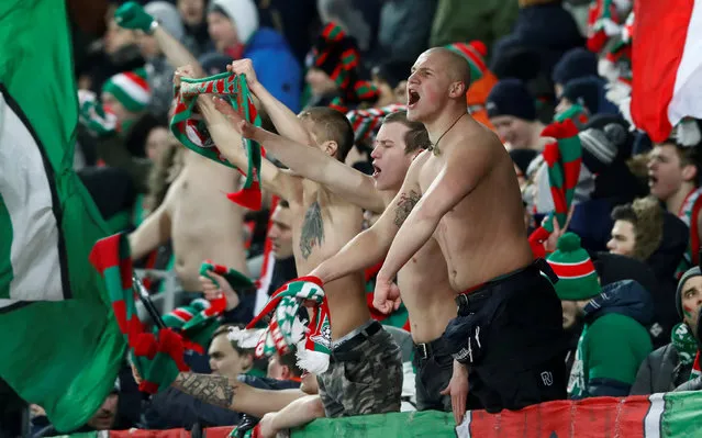Lokomotiv' s fans wave their banner cheering on their team during the Europa League Round of 32 second leg soccer match between Lokomotiv Moscow and Nice at Lokomotiv stadium in Moscow, Russia, Thursday, February 22, 2018. (Photo by Sergei Karpukhin/Reuters)