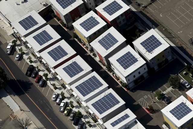Solar panels are seen on the roofs of buildings in Fresno, California, United States May 6, 2015. (Photo by Lucy Nicholson/Reuters)