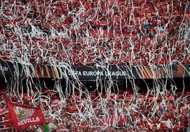 Sevilla fans cheer their team during the UEFA Europa League semi-final second leg football match between Sevilla FC and Juventus at the Ramon Sanchez Pizjuan stadium in Seville on May 18, 2023. (Photo by Cristina Quicler/AFP Photo)