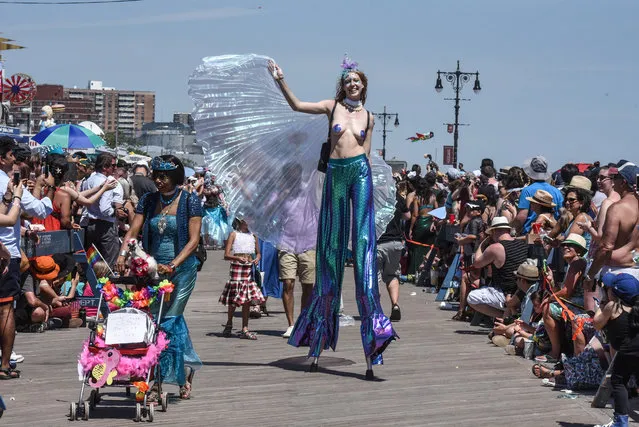 People participate in the 36th annual Mermaid Parade in Coney Island on June 16, 2018 in New York City. (Photo by Stephanie Keith/Getty Images)