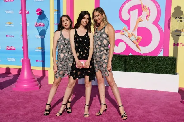 American musicians Este Haim, Alana Haim and Danielle Haim of HAIM pose on the pink carpet for the world premiere of the film “Barbie” in Los Angeles, California, U.S., July 9, 2023. (Photo by Mike Blake/Reuters)