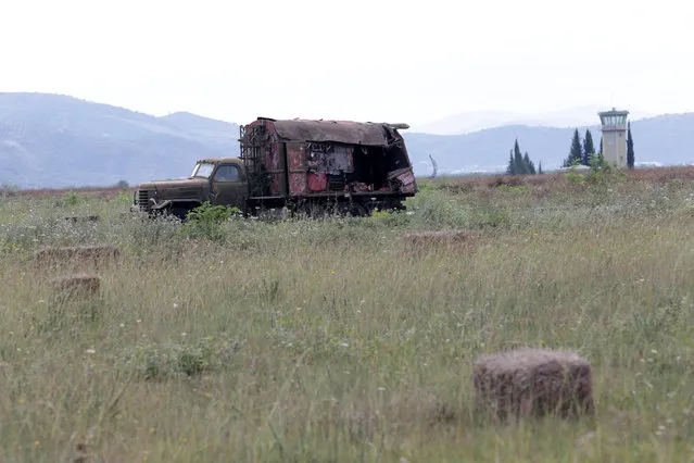 An old Albanian military vehicle is pictured in Kucova Air Base in Kucova, Albania on October 3, 2018. The runway, conceived by Soviet planners who stored dynamite under the airfield to blow it up should it fall into enemy hands and built by political prisoners in the 1950s, has good weather conditions all year round. (Photo by Florion Goga/Reuters)