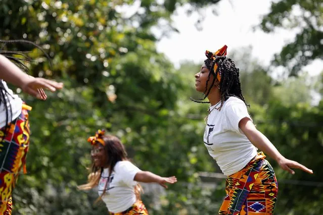Jamya Jamison, 17, performs traditional West African dance at the Juneteenth celebration at Memorial Park in Kingsport, Tennessee, U.S. June 19, 2021. (Photo by Chris Aluka Berry/Reuters)