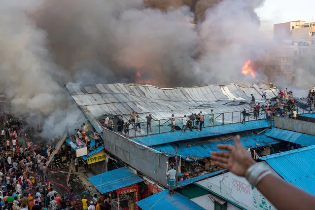 A general view after a fire broke out at the Mohammadpur Krishi Market in, Dhaka, Bangladesh on September 14, 2023, in this picture obtained from social media. (Photo by Arshadul Hoque Rocky via Reuters)