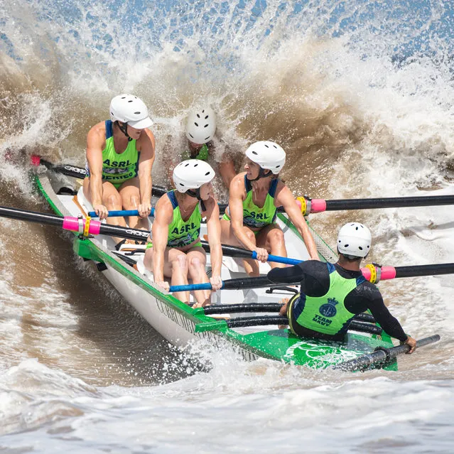 Punching through the sandbar. The Currumbin Concords on the way to winning the Australian Surf Rowers League Open at Mollymook. (Photo by Malcolm Trees/Women in Sport Photo Action Awards 2021)