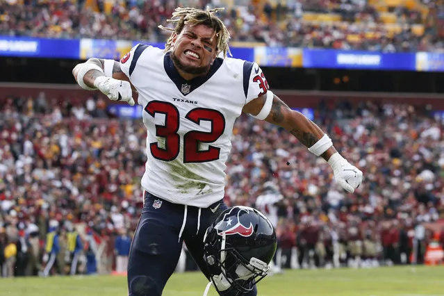 Houston Texans free safety Tyrann Mathieu (32) celebrates strong safety Justin Reid's interception and touchdown during the first half of an NFL football game against the Washington Redskins, Sunday, November 18, 2018 in Landover, Md. (Photo by Alex Brandon/AP Photo)