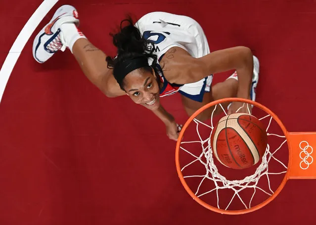A'Ja Wilson #9 of Team United States \eyes the ball in the basket against Japan during the second half of a Women's Basketball Preliminary Round Group B game on day seven of the Tokyo 2020 Olympic Games at Saitama Super Arena on July 30, 2021 in Saitama, Japan. (Photo by Aris Messinis/Pool via Getty Images)