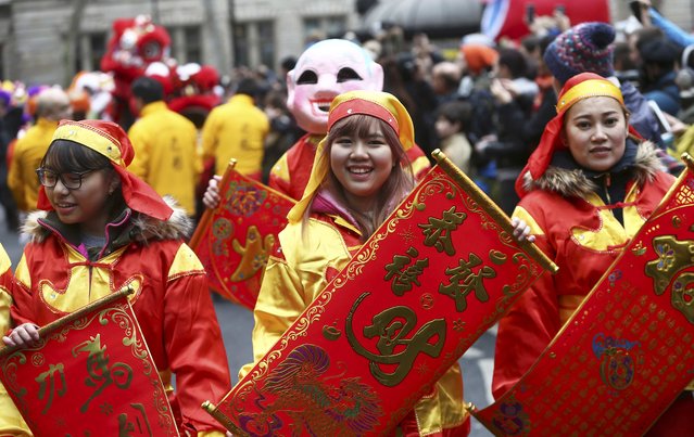 Participants wear costumes as they take part in an event to celebrate the Chinese Lunar New Year of the Rooster in London, Britain, January 29, 2017. (Photo by Neil Hall/Reuters)