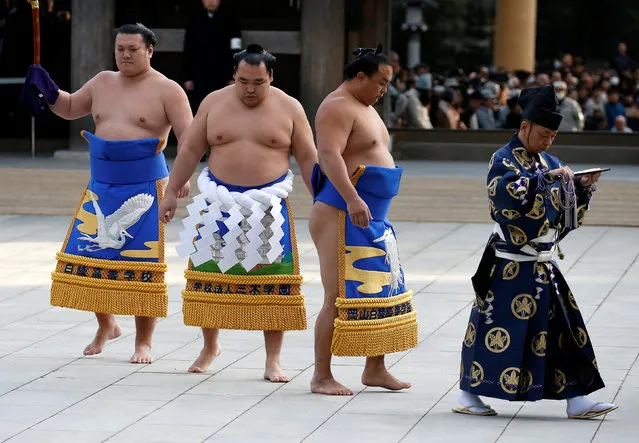 Mongolian-born grand sumo champion Yokozuna Kakuryu (2nd L) arrives for performing the New Year's ring-entering rite at the annual celebration for the New Year at Meiji Shrine in Tokyo, Japan January 6, 2017. (Photo by Issei Kato/Reuters)