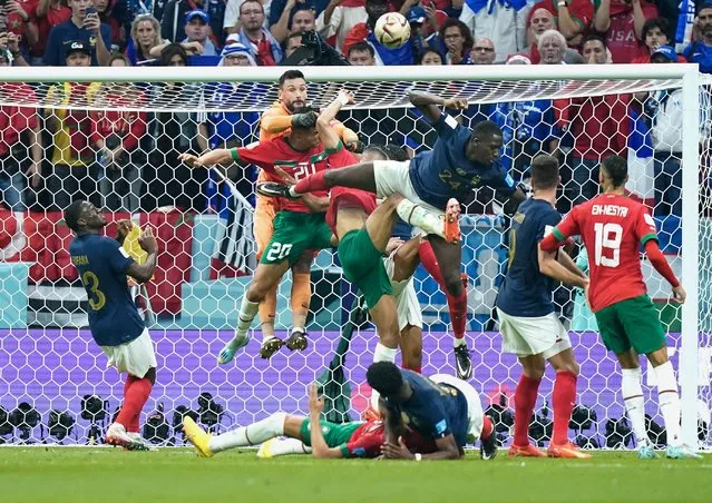 France goalkeeper Hugo Lloris (1) punches away the ball on a corner kick during the semi final FIFA World Cup 2022 match against Morocco at Al Bayt Stadium in Khor on December 14, 2022. (Photo by Jabin Botsford/The Washington Post)