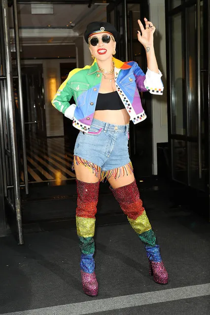 Lady Gaga steps out wearing a Versace rainbow ensemble in New York City on June 28, 2019. (Photo by Felipe Ramales/Splash News and Pictures)